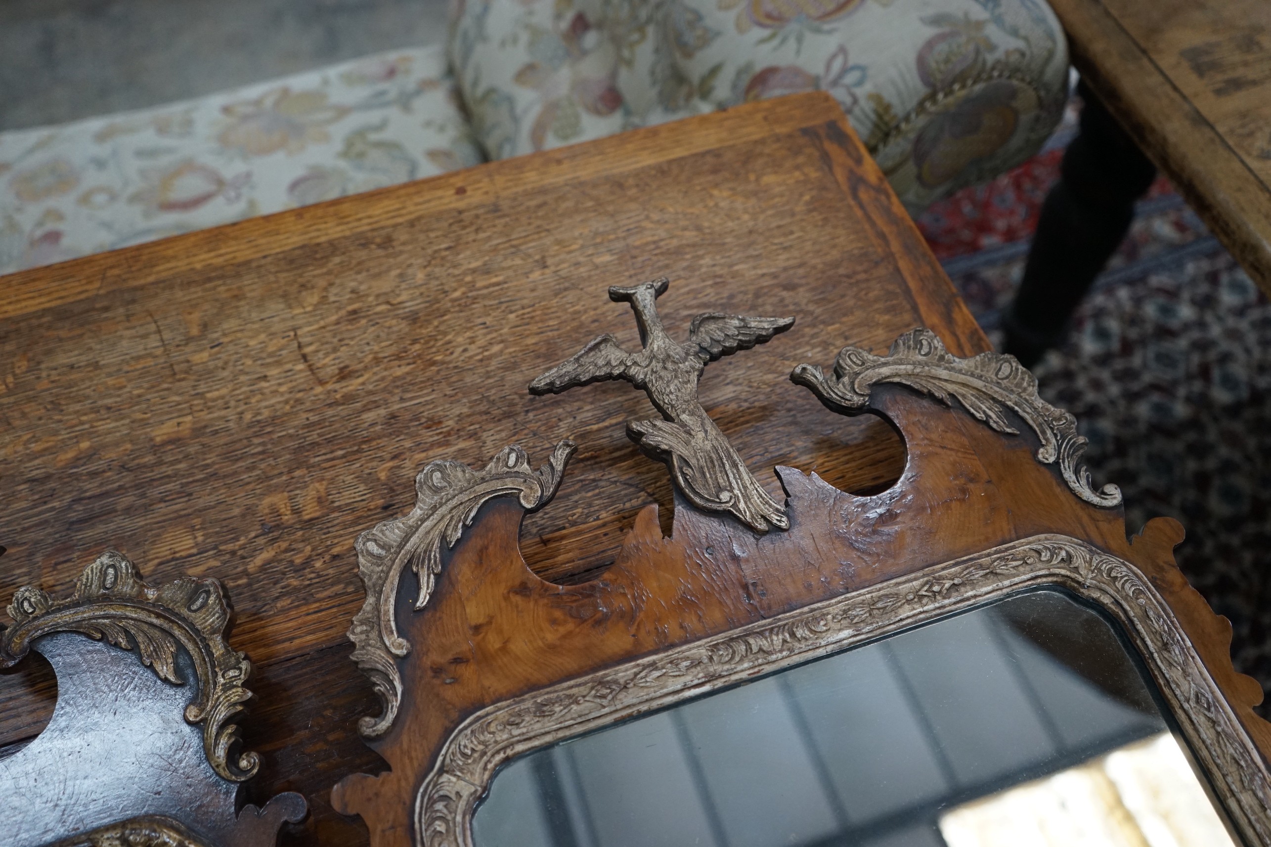 A pair of George III style yew fret cut wall mirrors, width 40cm, height 76cm